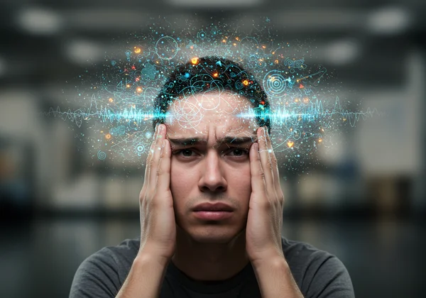 Person overwhelmed by sensory input, illustrating HSP burnout.